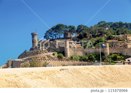 Medieval fortress against the backdrop of a clear blue sky Medieval fortress against the backdrop of a clear blue sky 115878066