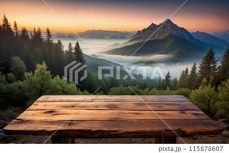 empty wooden table on a background of mountains and sunset 115878607