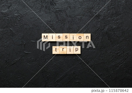 Mission Trip word written on wood block. Mission Trip text on table, concept Mission Trip word written on wood block. Mission Trip text on table, concept 115878642