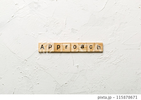 APPROACH word written on wood block. APPROACH text on cement table for your desing, concept 115878671