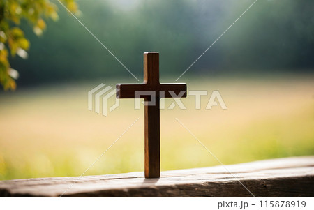 Jesus Christ cross, Christian cross on a bokeh, blurred background 115878919