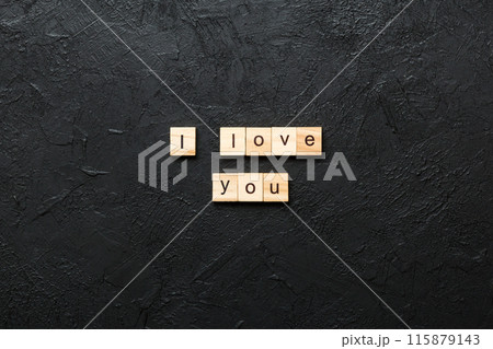 i love you word written on wood block. i love you text on table, concept 115879143