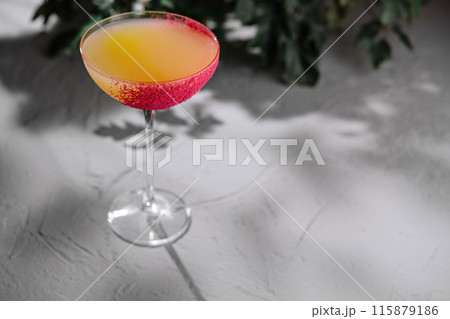 Elegant cocktail with sugar rim on modern surface 115879186