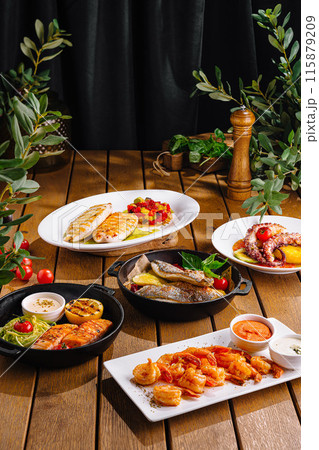 Gourmet seafood mediterranean feast on rustic table Gourmet seafood mediterranean feast on rustic table 115879209