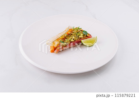 Gourmet tuna tartare with fresh herbs and lime 115879221