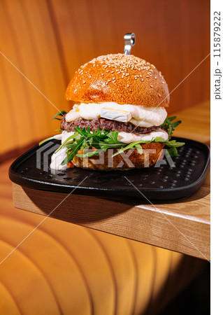 Gourmet beef burger with fresh toppings 115879222