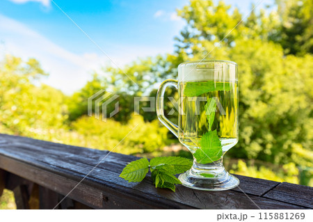 Glass of mint tea. 115881269
