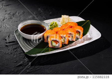 California roll sushi with tobiko on dark background 115882228