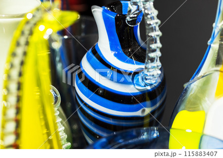 Colorful craft vases made of glass, close-up photo 115883407