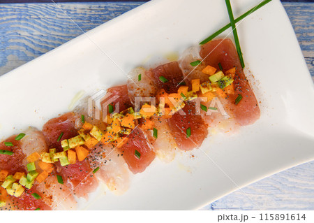 FISH CEVICHE RECIPE, SEA BREAM AND TUNA, AVOCADO, BELL PEPPER, CHILLI, CHIVES, LEMON, OLIVE OIL 115891614