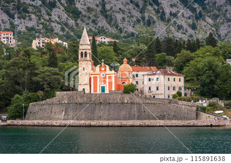 Old church on hill. View from water to landmark. Beautiful landscape of Montenegro at summer season 115891638