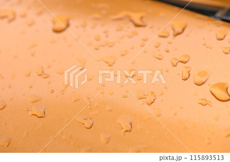 Background - raindrops on the metal surface of a modern car 3 Background - raindrops on the metal surface of a modern car 3 115893513