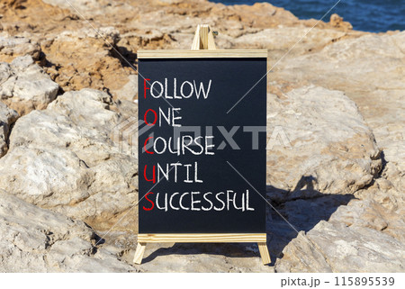 FOCUS follow one course until successful symbol. Concept words FOCUS follow one course until successful on blackboard. Stone background. Business FOCUS follow one course until successful concept. FOCUS follow one course until successful symbol. Concept words FOCUS follow one course until successful on blackboard. Stone background. Business FOCUS follow one course until successful concept. 115895539