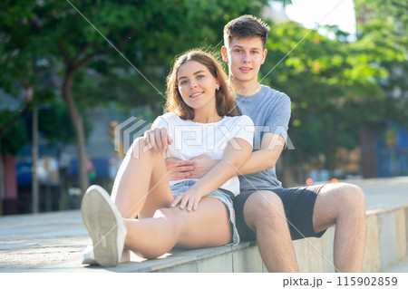 Portrait of happy teenagers on city street Portrait of happy teenagers on city street 115902859