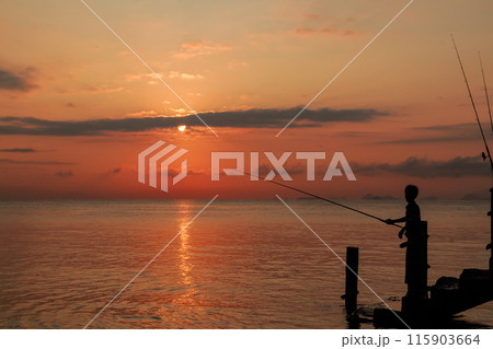 sunrise on the beach pier bridge with a clear sky sunrise on the beach pier bridge with a clear sky 115903664