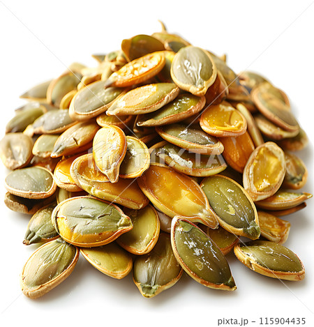 A pile of pumpkin seeds, a staple food ingredient, is displayed on a clean white background. These natural seeds can be used in various dishes and cuisines 115904435