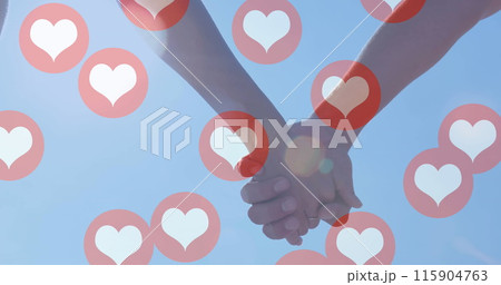 Image of red heart icons floating over mid section of couple in love holding hands Image of red heart icons floating over mid section of couple in love holding hands 115904763