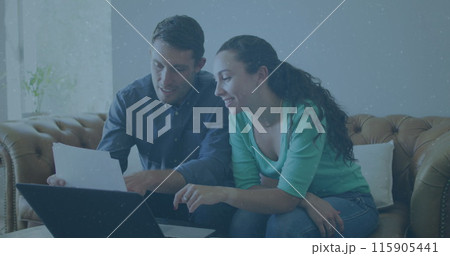Image of icons with growing numbers over caucasian couple using laptop 115905441