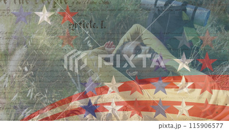 Image of stripes and stars moving over woman lying on meadow 115906577
