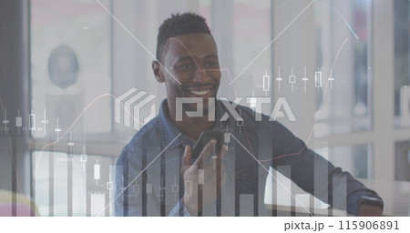 Image of financial data and graphs over happy african american man using smartphone 115906891