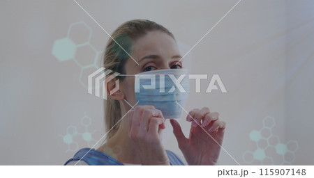 Image of data processing over caucasian woman with face mask Image of data processing over caucasian woman with face mask 115907148