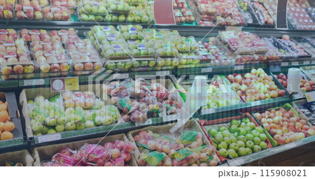 Image of financial data and graphs over fruits and vegetables in market 115908021