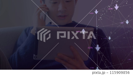 Image of web of connections with icons and numbers floating over asian man using a digital tablet an 115909856