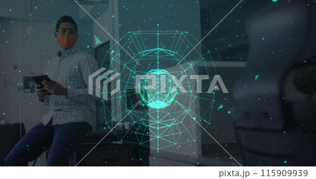 Globe of network of connections against man wearing face mask using digital tablet at office Globe of network of connections against man wearing face mask using digital tablet at office 115909939