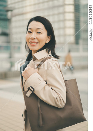a forty-something woman a forty-something woman 115910342