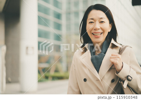 a forty-something woman a forty-something woman 115910348