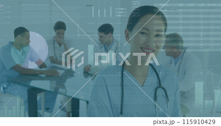 Image of graphs and data over happy biracial female doctor and diverse doctors in background 115910429