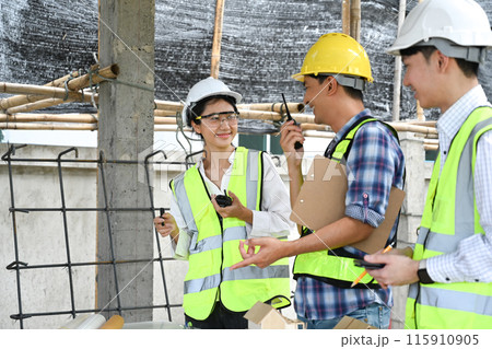 Engineer team and architect planning development details about project at construction site 115910905