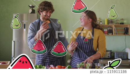 Image of fruit icons over caucasian couple cooking Image of fruit icons over caucasian couple cooking 115911186