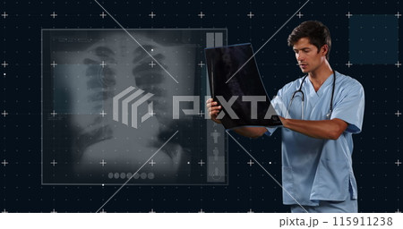 Image of caucasian male doctor with x ray photo and x ray photo on black background 115911238