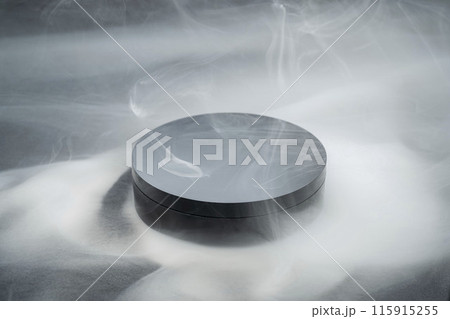 Round platform surrounded by smoke displaying minimalist concept 115915255