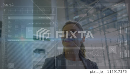 Image of data processing on screens over smiling caucasian businesswoman in modern building 115917376