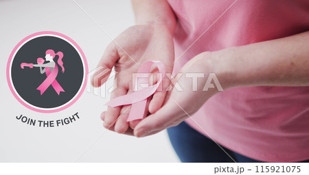 Join the fight text banner with female boxer icon against mid section of woman holding a pink ribbon 115921075