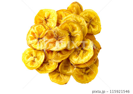A closeup view pile of crispy banana chips snack isolated on white, perfect for snacking and part of a healthy diet A closeup view pile of crispy banana chips snack isolated on white, perfect for snacking and part of a healthy diet 115921546