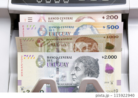 Uruguayan peso in the counting machine 115922940