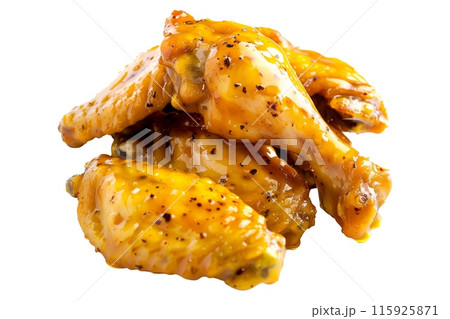 Delicious crispy honey Mustard chicken wings garnished with fresh cilantro, great for appetizers or main meals 115925871