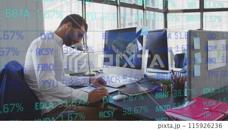 Image of trading board over caucasian male architect writing on notepad at office Image of trading board over caucasian male architect writing on notepad at office 115926236