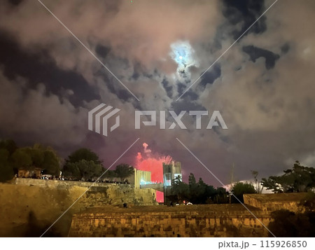 Fireworks over the walls of the old city of Valetta, Malta with panoramic view. Fireworks over the walls of the old city of Valetta, Malta with panoramic view. 115926850