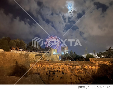 Fireworks over the walls of the old city of Valetta, Malta with panoramic view. Fireworks over the walls of the old city of Valetta, Malta with panoramic view. 115926852
