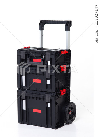 Big black toolbox for carried construction tools on wheels, on white background, isolated 115927147