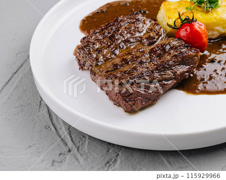 Gourmet grilled steak with potato and sauce 115929966