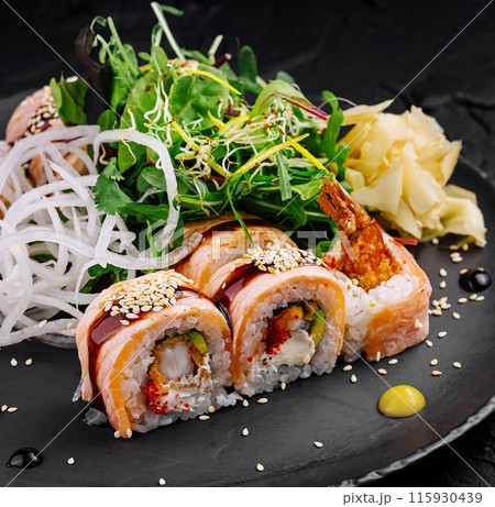 Gourmet sushi platter on black slate 115930439