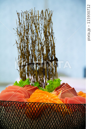 Buffet meals in luxury hotels often include a variety of food options from all over the world. Buffet meals in luxury hotels often include a variety of food options from all over the world. 115930712