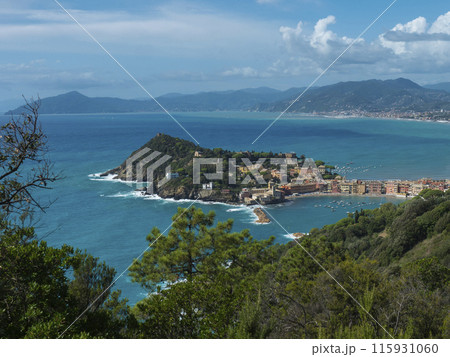 Panoramic aerial view of Bay of Silence and colorful, picturesque historical town Sestri Levante, Italy, popular resort in Liguria italian Mediterranean sea coast penisula. From Punta Manara path 115931060