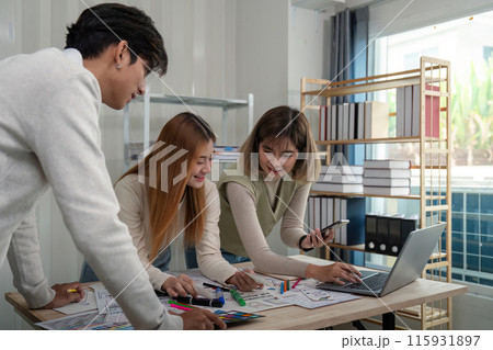 UX Developer and UI Designer Team Collaboration and Brainstorming Ideas in Modern Office Environment UX Developer and UI Designer Team Collaboration and Brainstorming Ideas in Modern Office Environment 115931897