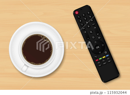 TV remote control and coffee cup top view 115932044